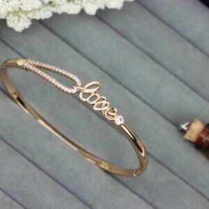 Elegant Rose Gold ""Love"" Bangle with Sparkling CZ Accents, XPBL0582